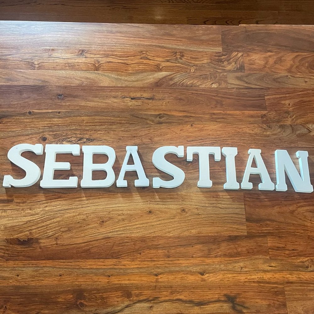 White Wood Letters Spelling: Sebastian